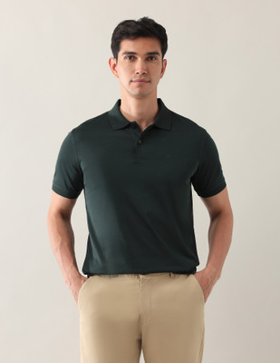 ARROW Solid Men Polo Neck Green T-Shirt