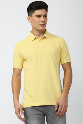 VAN HEUSEN Solid Men Polo Neck Yellow T-Shirt