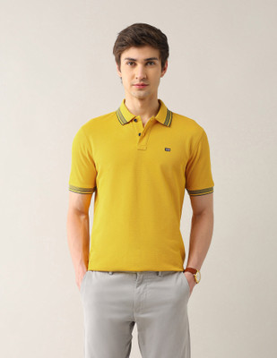 Arrow Sport Solid Men Polo Neck Yellow T-Shirt