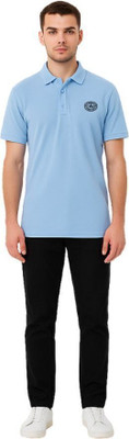 Humburg Solid Men Polo Neck Light Blue T-Shirt