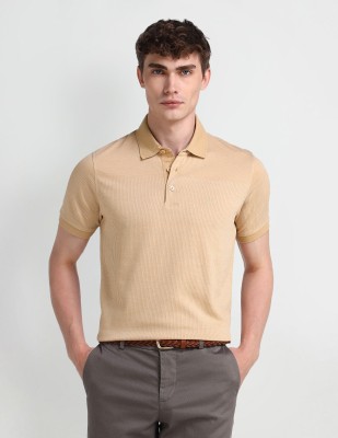 ARROW Solid Men Polo Neck Beige T-Shirt