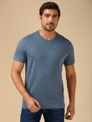 VAN HEUSEN Solid Men Round Neck Yellow T-Shirt