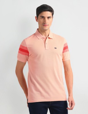 Arrow Sport Self Design Men Polo Neck Orange T-Shirt