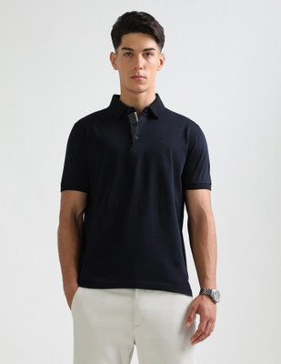 ARROW Solid Men Polo Neck Blue T-Shirt