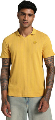 PUMA Solid Men Polo Neck Yellow T-Shirt