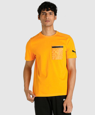 PUMA Solid Men Crew Neck Orange T-Shirt