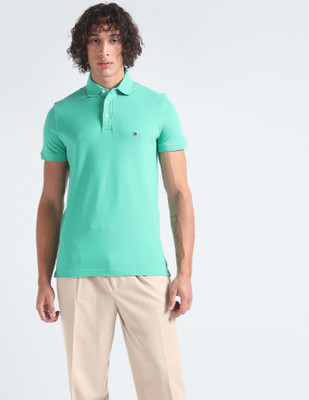 TOMMY HILFIGER Solid Men Polo Neck Light Blue T-Shirt