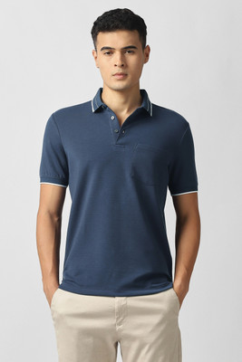 VAN HEUSEN Solid Men Polo Neck Dark Blue T-Shirt