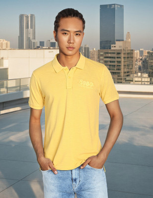 FLYING MACHINE Solid Men Polo Neck Yellow T-Shirt