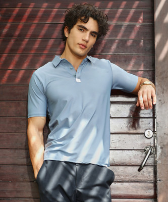 CAMPUS SUTRA Solid Men Polo Neck Blue T-Shirt