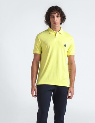 TOMMY HILFIGER Solid Men Polo Neck Yellow T-Shirt