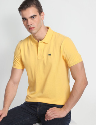 Arrow Sport Solid Men Polo Neck Yellow T-Shirt