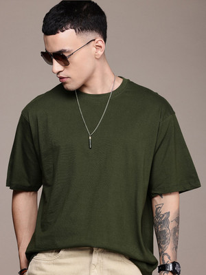 Roadster Solid Men Round Neck Dark Green T-Shirt