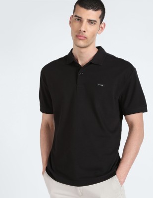 Calvin Klein Jeans Solid Men Polo Neck Black T-Shirt