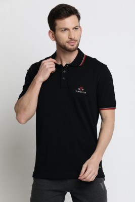 VAN HEUSEN Solid Men Polo Neck Black T-Shirt