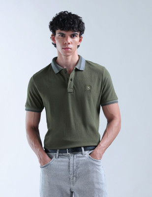 FLYING MACHINE Solid Men Polo Neck Green T-Shirt