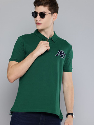 AEROPOSTALE Solid Men Polo Neck Green T-Shirt