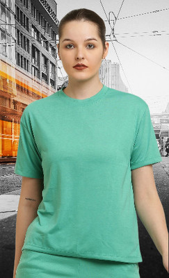 The Unicharm Solid Women Round Neck Dark Green T-Shirt