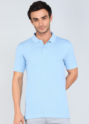 PARK AVENUE Solid Men Polo Neck Light Blue T-Shirt