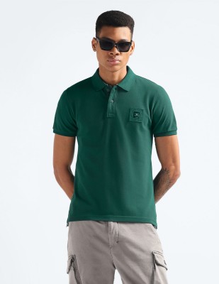 FLYING MACHINE Solid Men Polo Neck Green T-Shirt