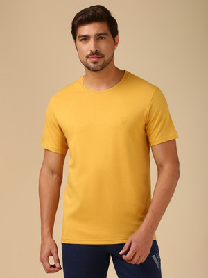 VAN HEUSEN Solid Men Round Neck Yellow T-Shirt