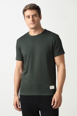 VAN HEUSEN Solid Men Crew Neck Green T-Shirt