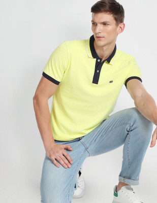 ARROW Solid Men Polo Neck Yellow T-Shirt