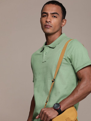 Roadster Solid Men Polo Neck Green T-Shirt