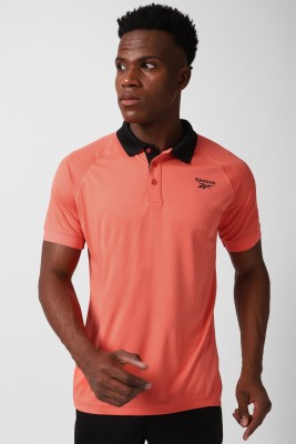 REEBOK Solid Men Polo Neck Orange T-Shirt