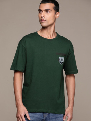 Roadster Solid, Printed Men Round Neck Green T-Shirt