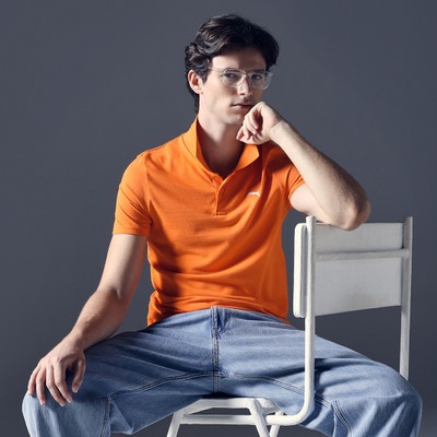 PUMA Solid Men Polo Neck Orange T-Shirt
