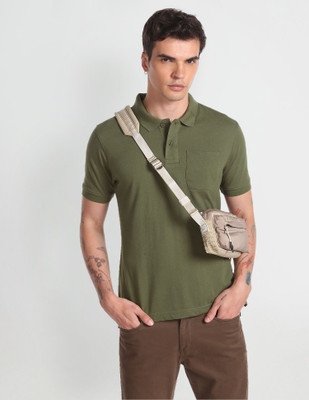 FLYING MACHINE Solid Men Polo Neck Green T-Shirt