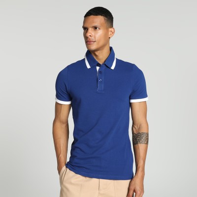 PUMA Solid Men Polo Neck Blue T-Shirt