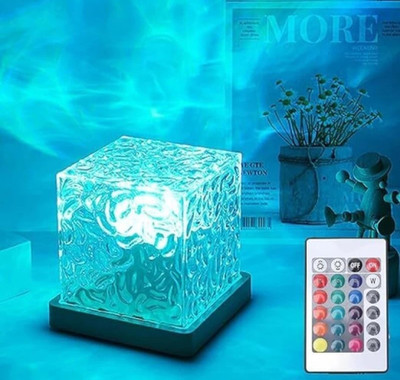 SHIVTRADRE Light Creative Bedside Flame Atmosphere Lamp Rotating Water Pattern Night Lamp(13 cm, Multicolor)