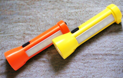 PLSUPREME Led Mini Torch Light With Charger Torch(Yellow, Orange, 10 cm, Rechargeable)
