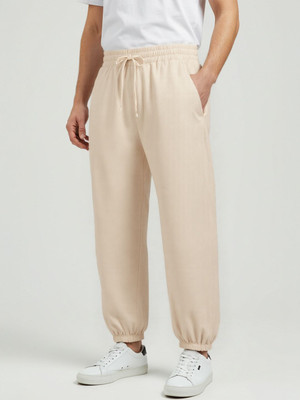 Glitchez Solid Men Beige Track Pants