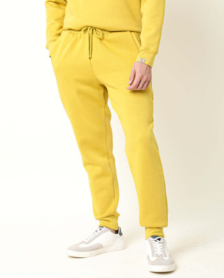Rare Rabbit Solid Men Yellow Track Pants