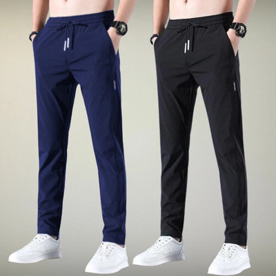 FICKA Solid Men Blue, Black Track Pants