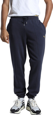 PUMA Solid Men Blue Track Pants