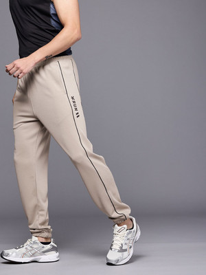 HRX by Hrithik Roshan Solid Men Beige Track Pants