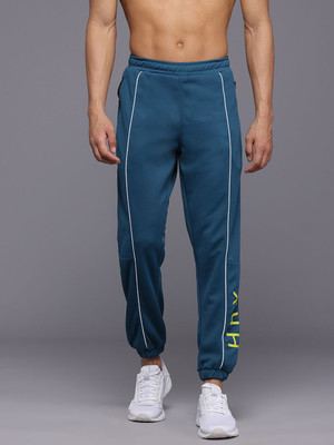 HRX by Hrithik Roshan Solid Men Green Track Pants