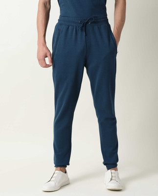 Rare Rabbit Solid Men Green Track Pants