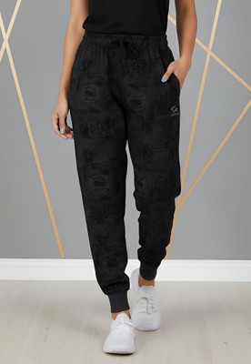 Guide Printed Women Black Track Pants