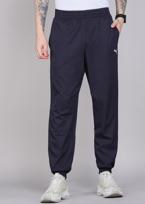 PUMA Solid Men Blue Track Pants
