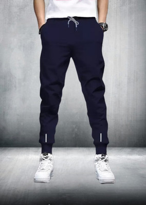 Nikshi Solid Men Blue Track Pants