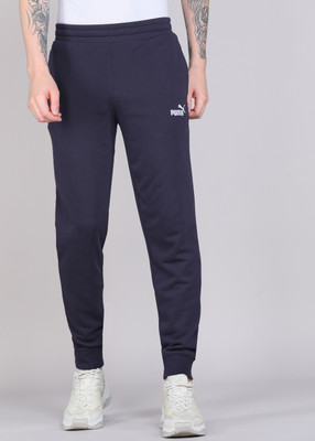 PUMA Solid Men Blue Track Pants