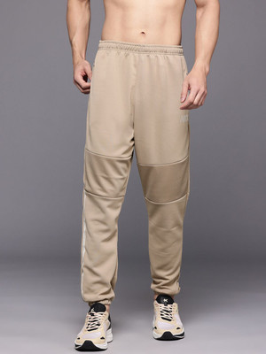 HRX by Hrithik Roshan Solid Men Beige Track Pants