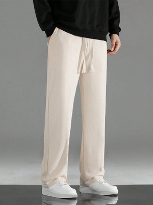 Adokedo Solid Men Beige Track Pants