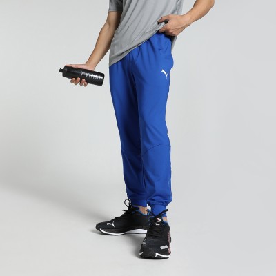 PUMA Solid Men Blue Track Pants