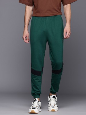 HRX by Hrithik Roshan Solid Men Green Track Pants